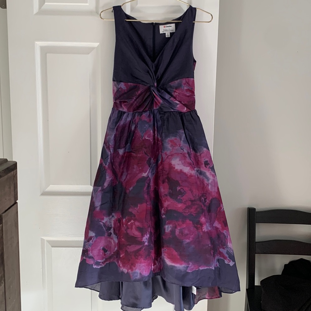 Mid length purple dress. Mid length